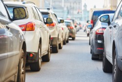 Cars sitting in traffic